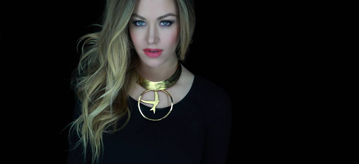 Main image of model with gold necklace